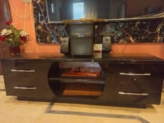 TV console in black with mirror on top and 4 draws condition 8/10