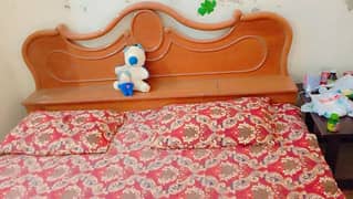 king size wooden bed with mattress