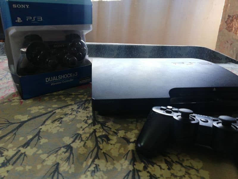 PS3 WITH TWO CONTROLLERS with jailbreak version 0