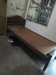 wooden bed available for sale