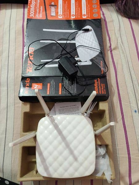 Tenda FH456 300 mbps 4 antenna strong signal smart router 1