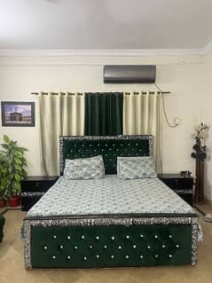 Beautiful King size bed with wooden side racks