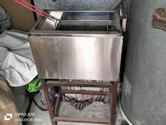 cash counter and single fryer