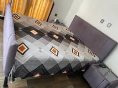 grey poshish bed with side tables without matress