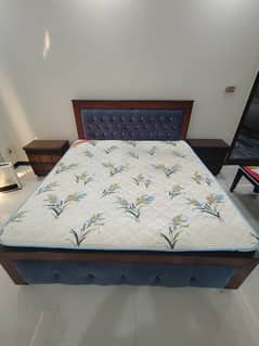 Queen size Wooden Bed With Spring Mattress And Two side Tables.