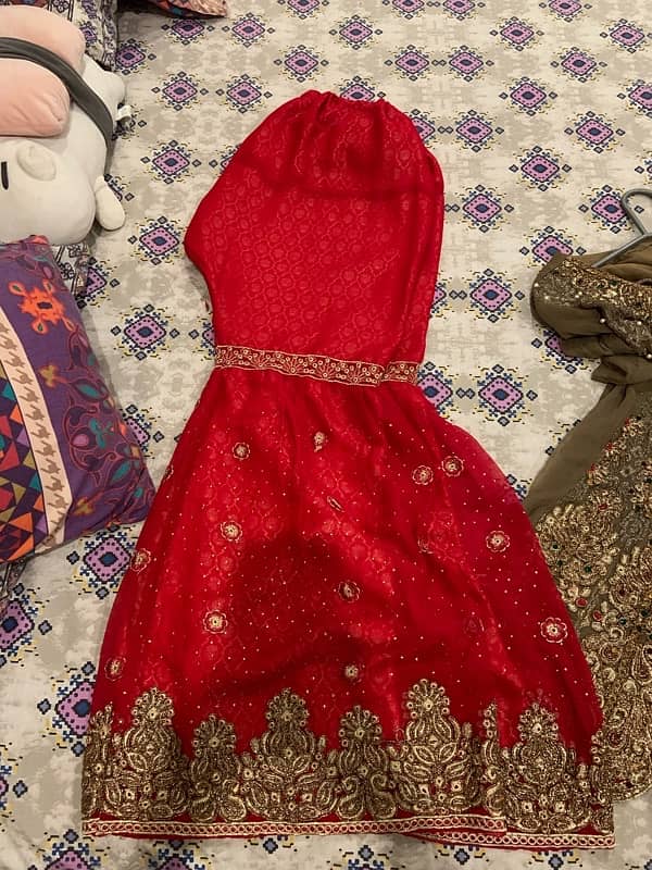 brown colour frock red colour sharara ache condion mein 0