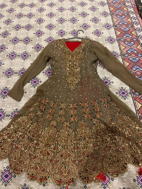 brown colour frock red colour sharara ache condion mein 1