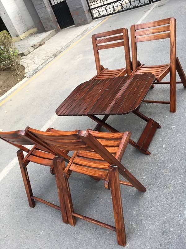 4 chairs and one table 4