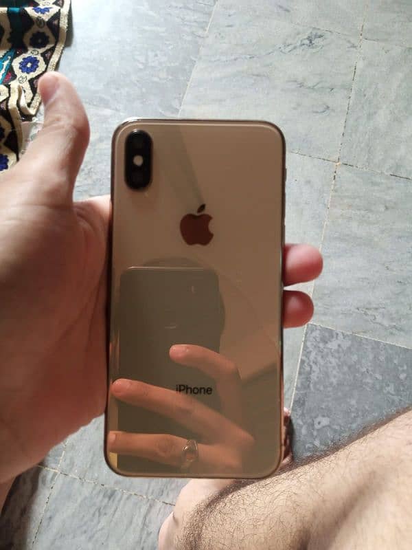 iPhone xs  rose golden dual sims pta 7