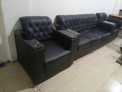 Sofa set 1 black in leather and 1 brown in cloth