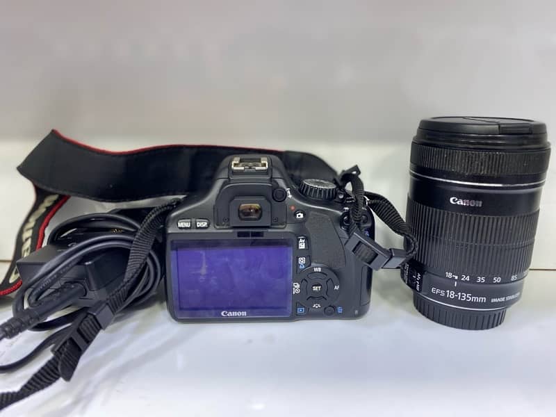 canon camera with charger and lens 1