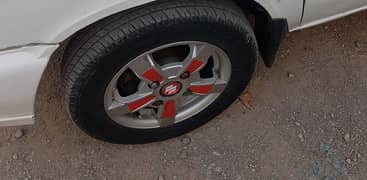 new tyre ha alloy rim bi sath he ha