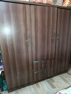 Bed and cupboard