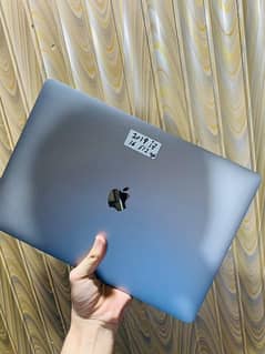 MacBook pro 2019 core i7 ram 16 512 ssd 15 inch  display 4gb graphic