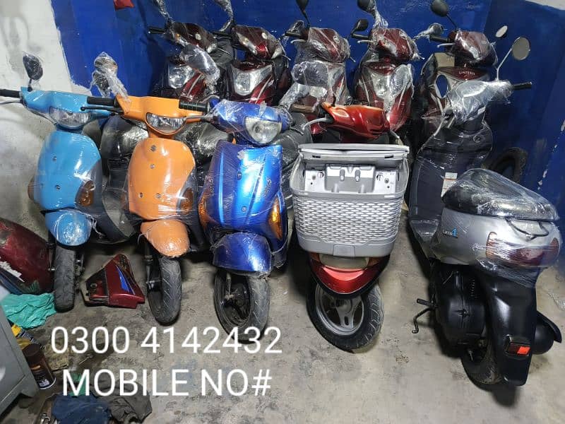 Electric scooty#49cc scooties available contact#0300 4142432# 1