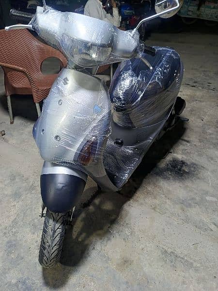 Electric scooty#49cc scooties available contact#0300 4142432# 14