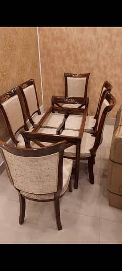 A one Badroom sat and daing chair