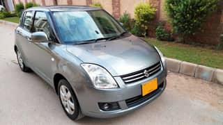 SUZUKI SWIFT DLX Manual Model 2014 Smoke Green color.