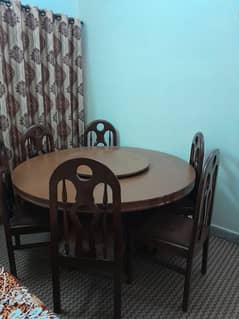 wooden dining table with 6 chairs