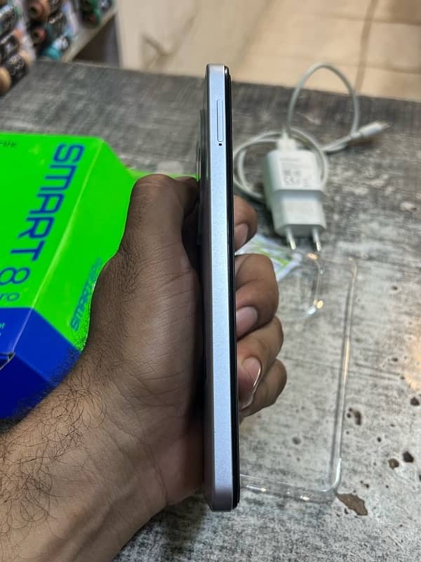 infinix smart 8 pro 4+4 128gb 8 mnths warranty 1