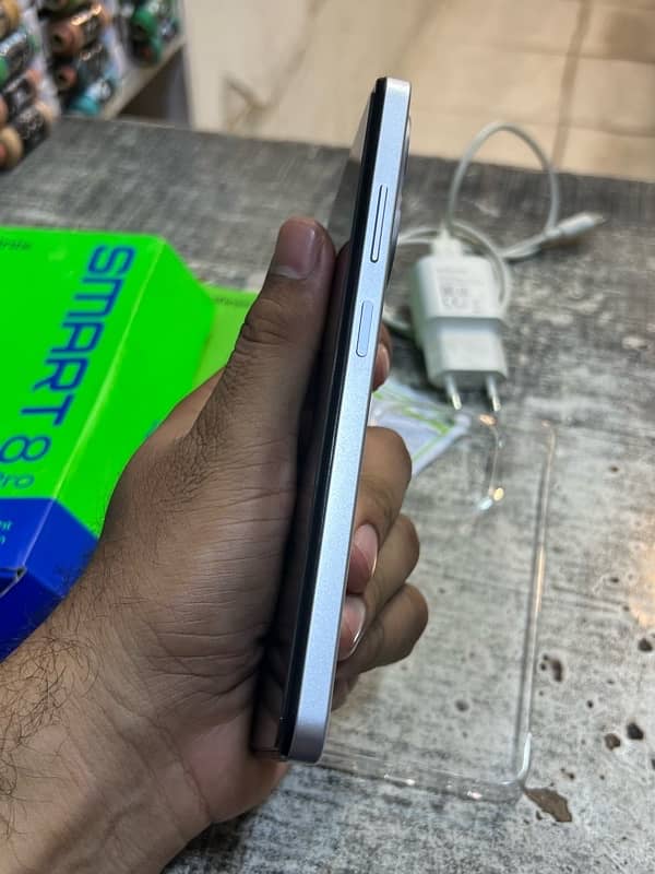 infinix smart 8 pro 4+4 128gb 8 mnths warranty 2