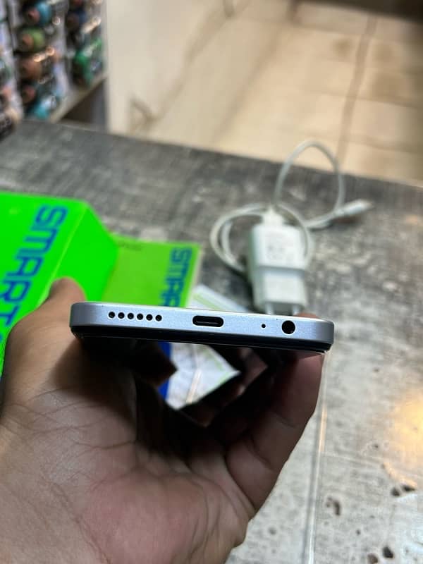 infinix smart 8 pro 4+4 128gb 8 mnths warranty 3