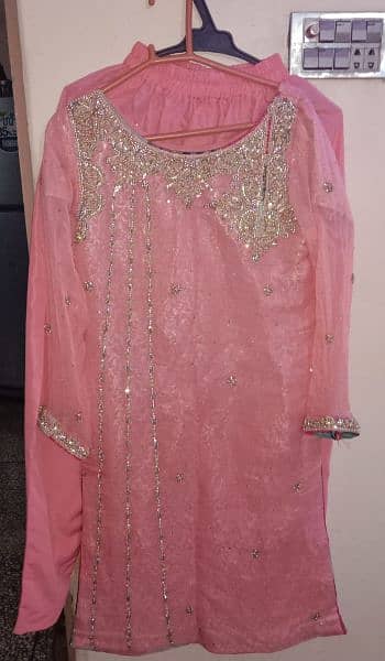 2 piece pink color suit available in Small size 1