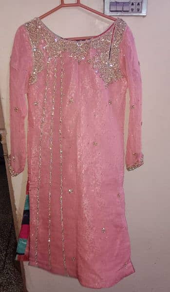 2 piece pink color suit available in Small size 2