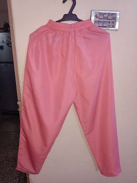 2 piece pink color suit available in Small size 4