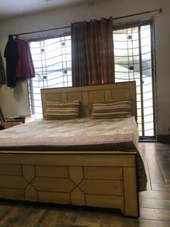 USED WOODEN KING SIZE BED WITH MATTRESSES AND SIDE TABLES