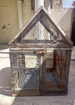 Hen cage in used condition made with sheet and wood