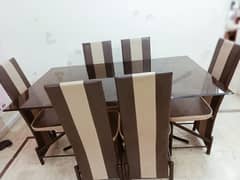 Dining table full size with 6 chairs condition is like brand new