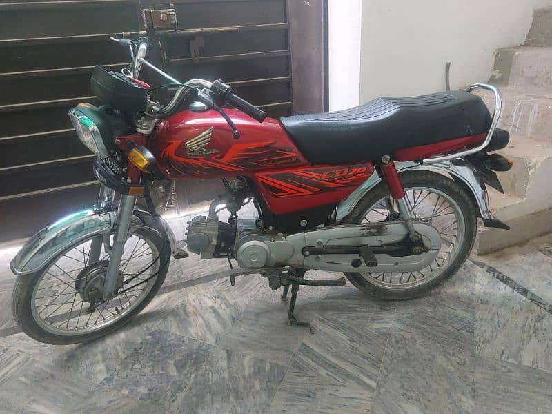 Honda 70 fixed price 1lakh2k  condition contact 03076120230  home used 2