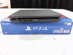 PS4 Slim (1 TB) With 2 Controllers and Box (10/10 Condition)