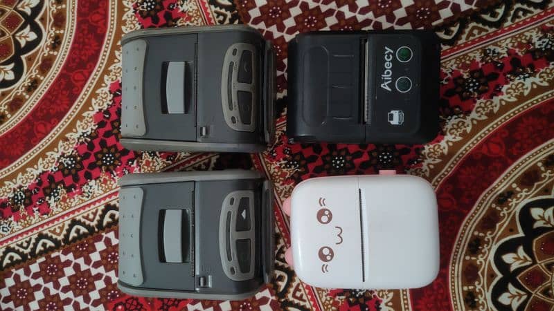 4 Mini Portable Bluetooth Printers 0