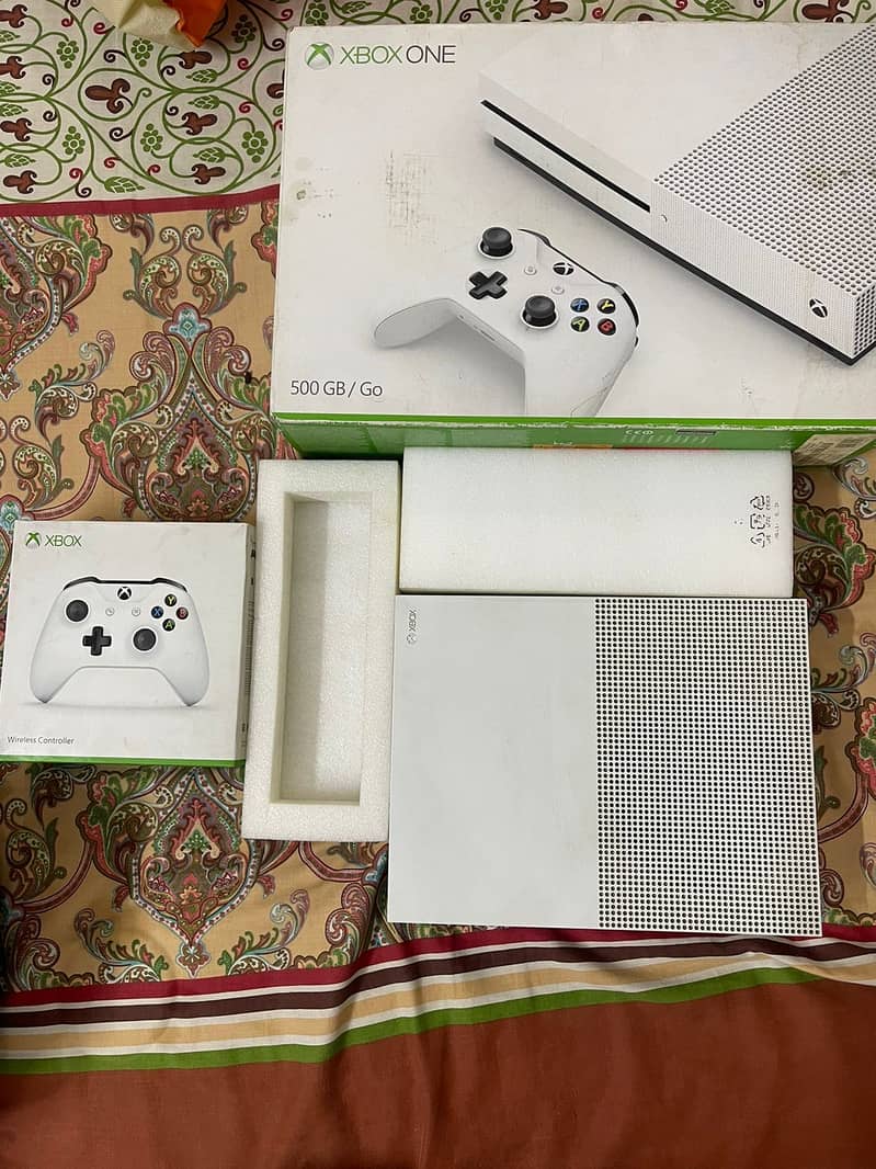 Xbox one S 10/10 condition with games and controllers 1