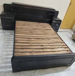 Bed with attached side tables for sale