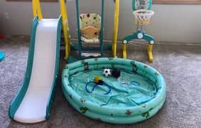 slide, swing, basketball stand, pool in excellent condition for kids 0