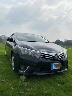 Toyota Corolla 2015 xli convert Gli islamabad number 03225322487