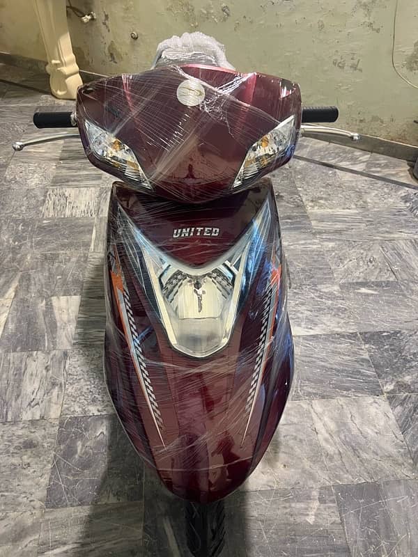 United 100cc petrol scooty 2024 1