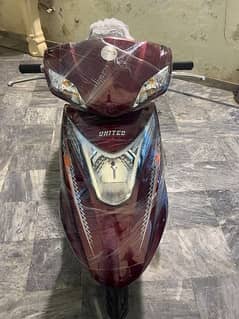 united 100cc self start scooty 2024