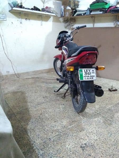 Honda cg Dream 125 fully new condition Lahore number 1