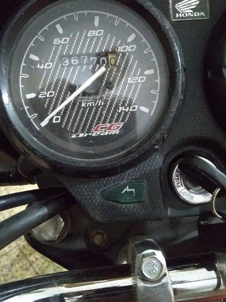 Honda cg Dream 125 fully new condition Lahore number 4