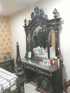 One Double Bed W/O  Metress
Two side Tables. 
One Dressing Table F Size