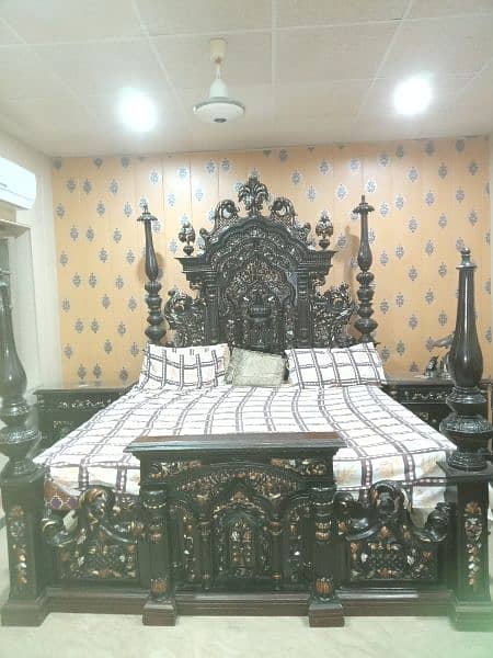 One Double Bed W/O  Metress
Two side Tables. 
One Dressing Table F Size 1