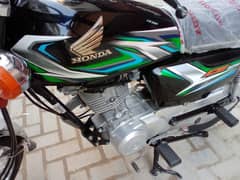 Honda 125 Karachi number 23 model