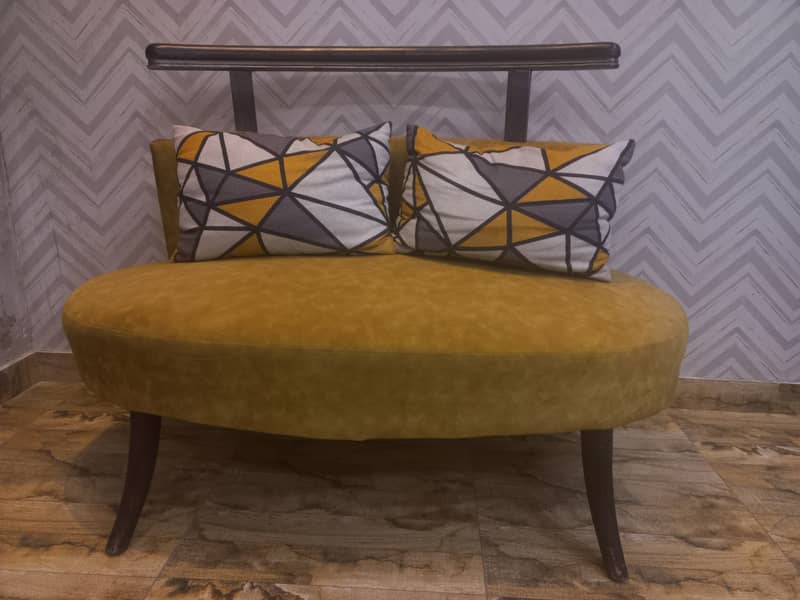 Oval shape two seater beautiful sofa. 1