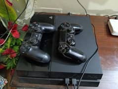 PS4 500GB with two controllers & games