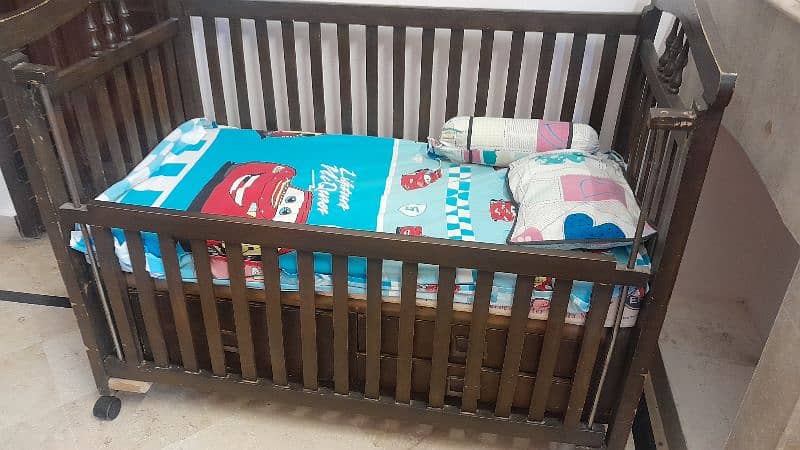 wooden baby cot with 3 drawers 1