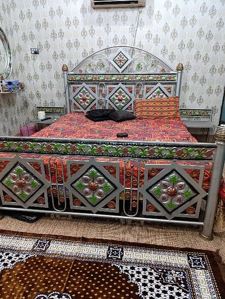 Iron bed with wall dressing 2